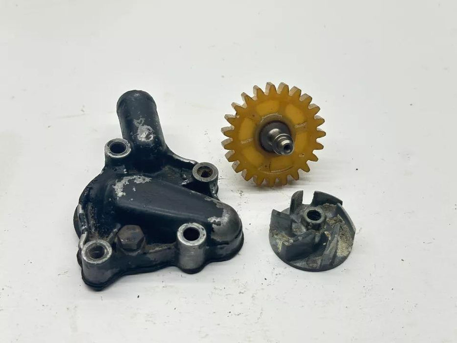 1987 Honda CR125R Water Pump Impeller Cover Kit Bolt Gear OEM Assembly CR 125