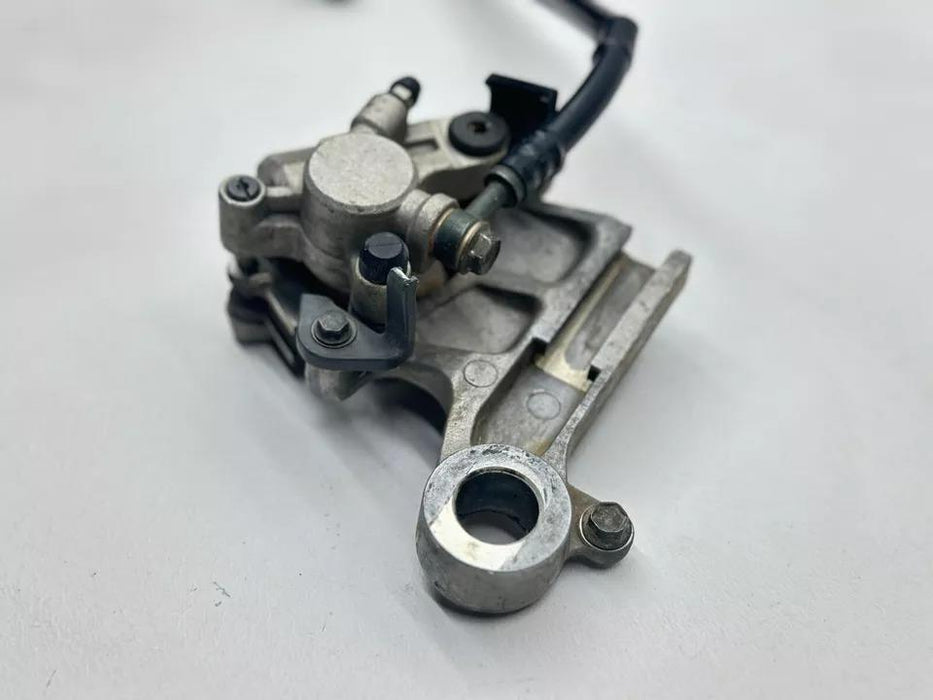 2000 Suzuki RM125 Nissin Rear Brake Assembly Master Cylinder Caliper Bracket