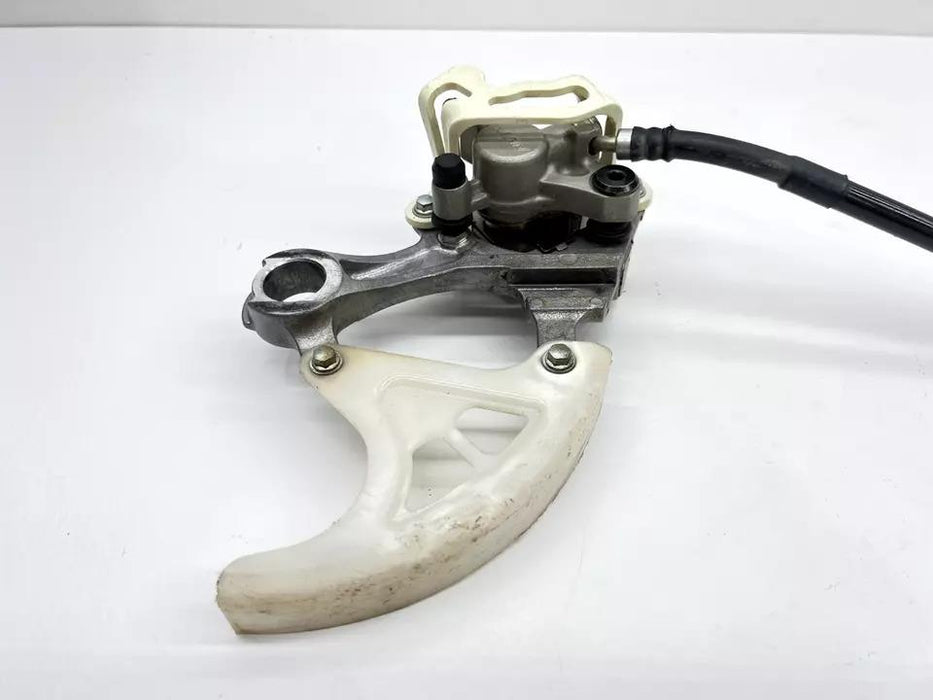 2007 Suzuki RMZ250 Nissin Rear Brake Assembly Caliper Master Cylinder Bracket