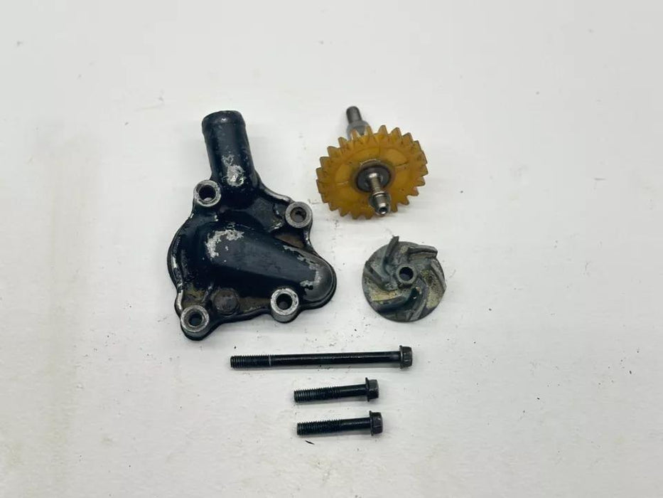 1987 Honda CR125R Water Pump Impeller Cover Kit Bolt Gear OEM Assembly CR 125